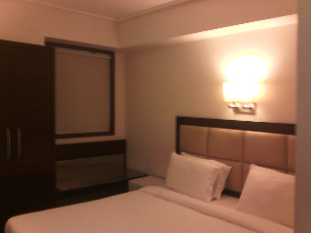 Hotel Better Home International Мумбаї Номер фото